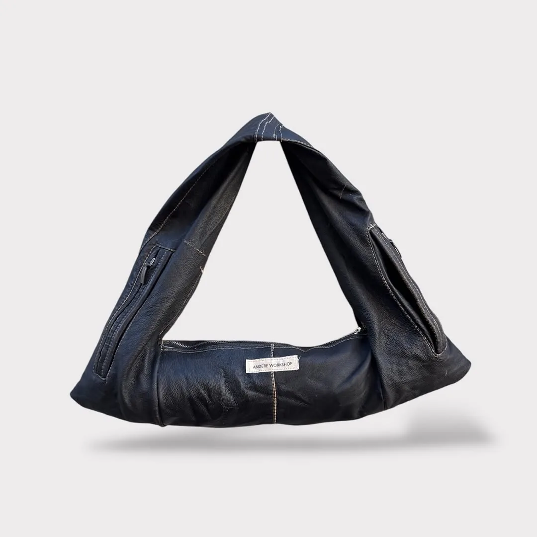 Ordinary with pockets, black leather bag