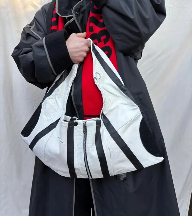 The Ordinary black white bag worn