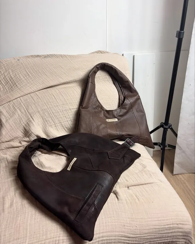 Shopper bags on a linen sheet